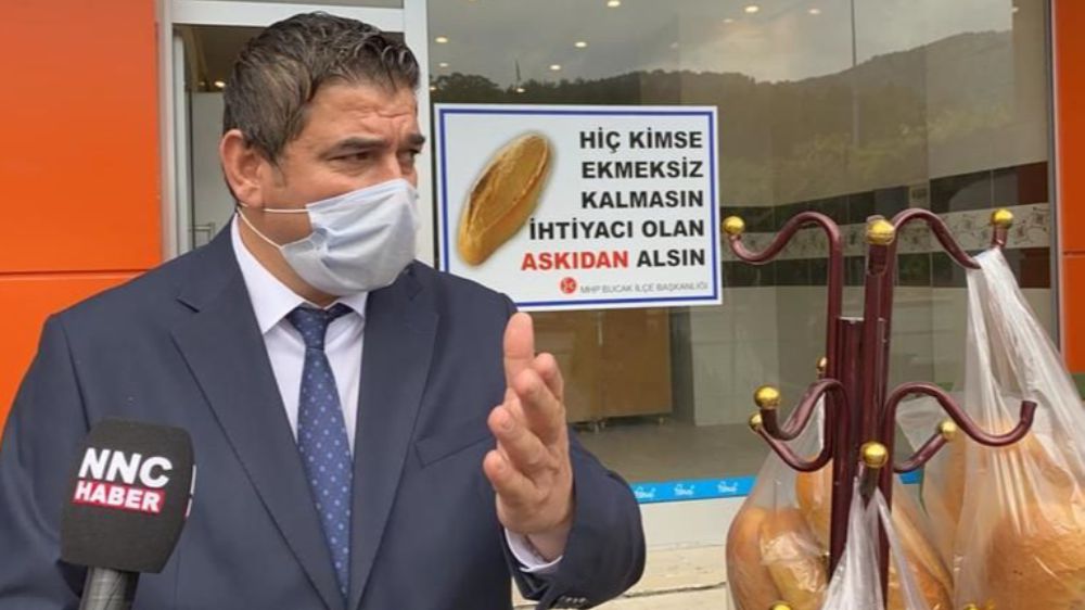MHP Bucak İlçe Başkanlığının Askıda Ekmek Kampanyasına Muhtarlardan Destek
