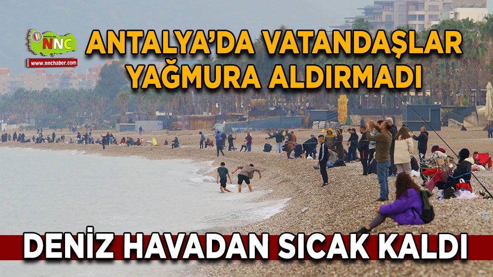 Antalya’da deniz havadan sıcak kaldı Yağmurlu havada Konyaaltı sahili keyfi