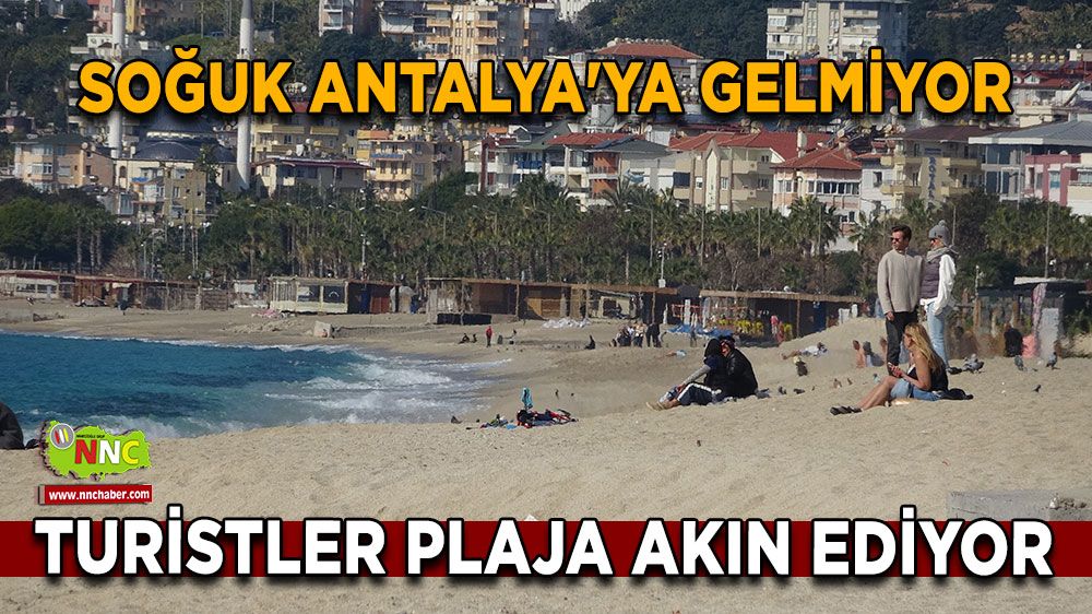 Soğuk Antalya'ya gelmiyor Turistler plaja akın ediyor