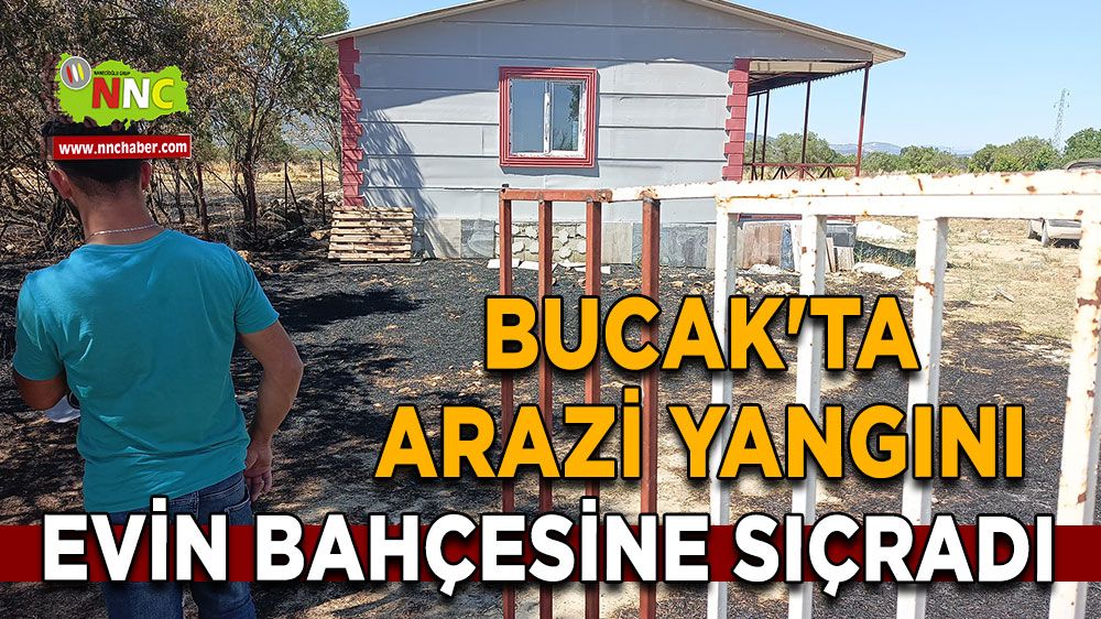 Bucak'ta arazi yangını evin bahçesine sıçradı
