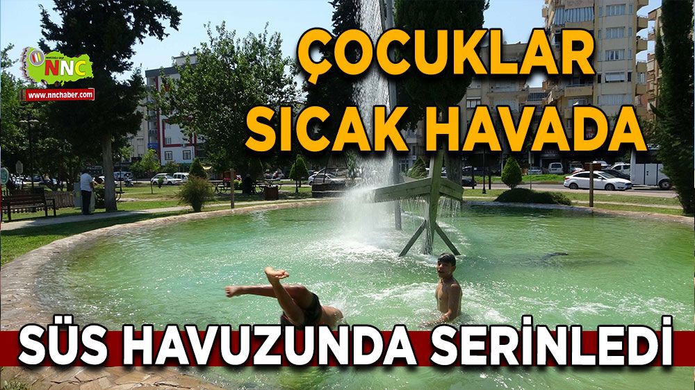 Çocuklar sıcak havada süs havuzunda serinledi