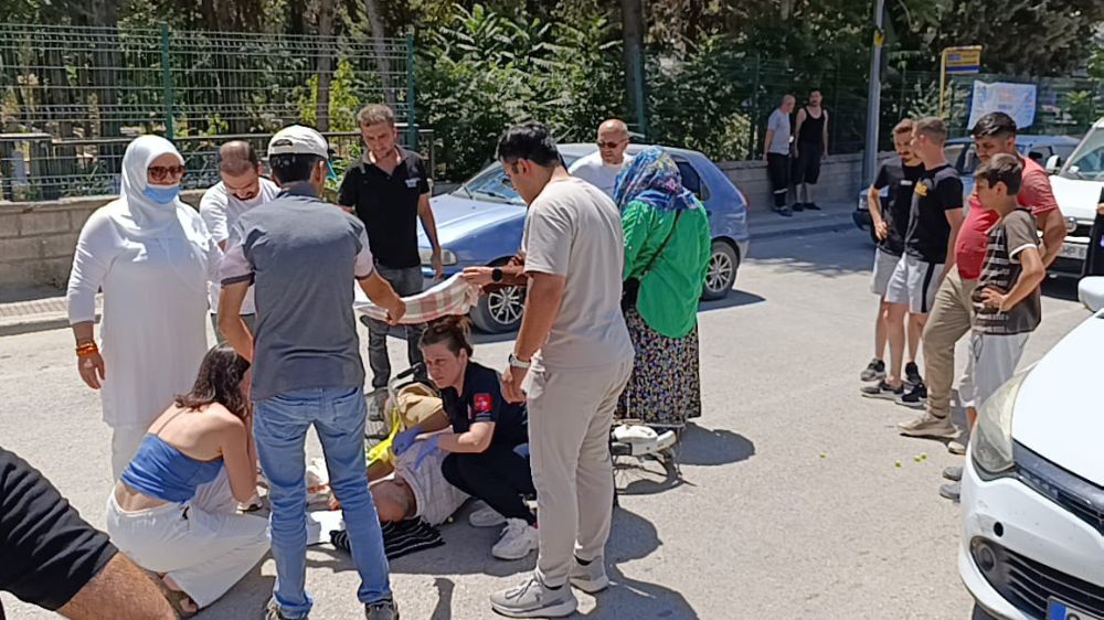 Yaralanan vatandaşı güneşten böyle korudular