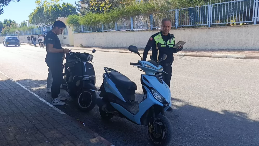 Denetime takılan motosikletli polisin arkasını dönmesini fırsat bilip 'U' dönüşü yaparak kaçtı