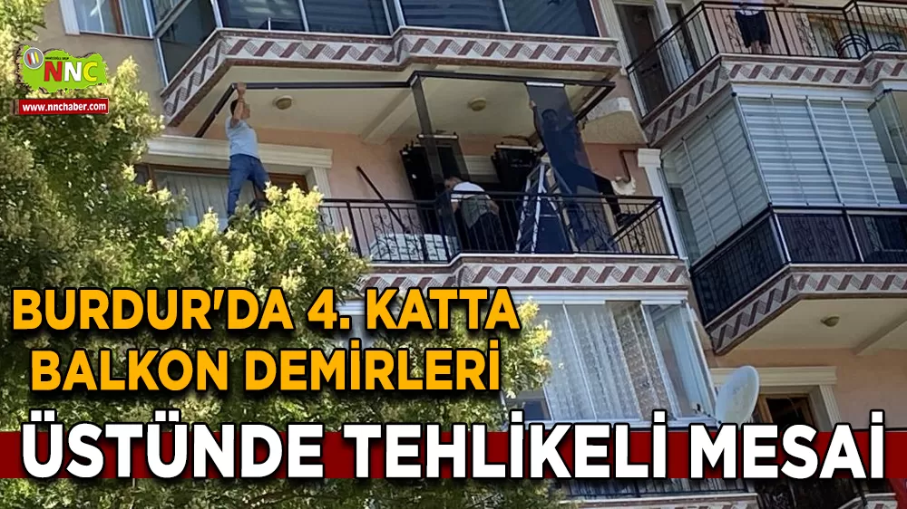 Burdur'da 4. katta balkon demirleri üstünde tehlikeli mesai