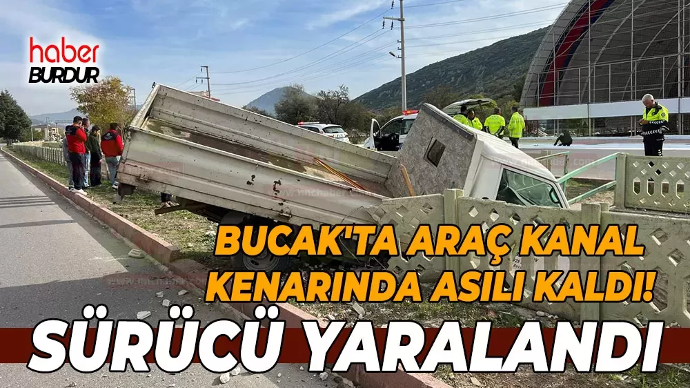 Bucak'ta otomobil kanal duvarında asılı kaldı Sürücü yaralandı