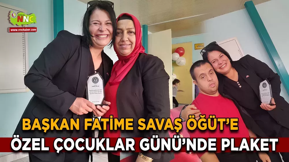 MHP Ağlasun İlçe Başkanı Fatime Savaş Öğüt’e özel çocuklar gününde plaket