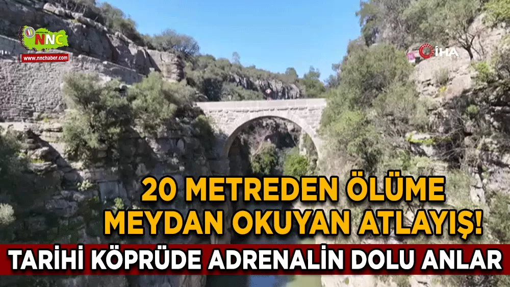 20 metreden ölüme meydan okuyan atlayış! Tarihi köprüde adrenalin dolu anlar